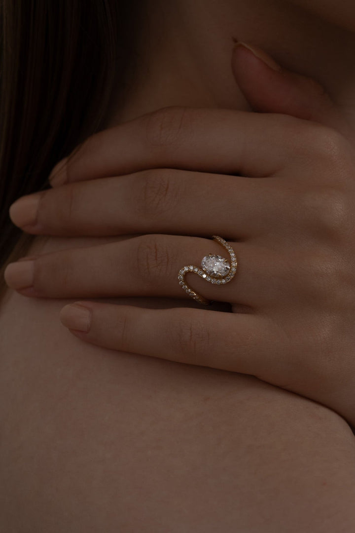 Certified oval cut diamond featured in solitaire engagement ring