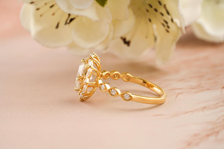 Close-up of oval cut center diamond in vintage engagement ring
