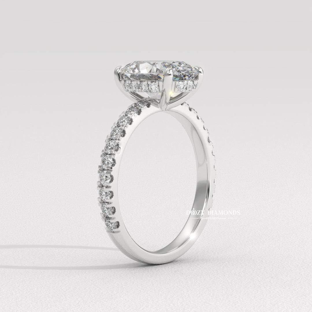 Side angle of oval hidden halo diamond engagement ring