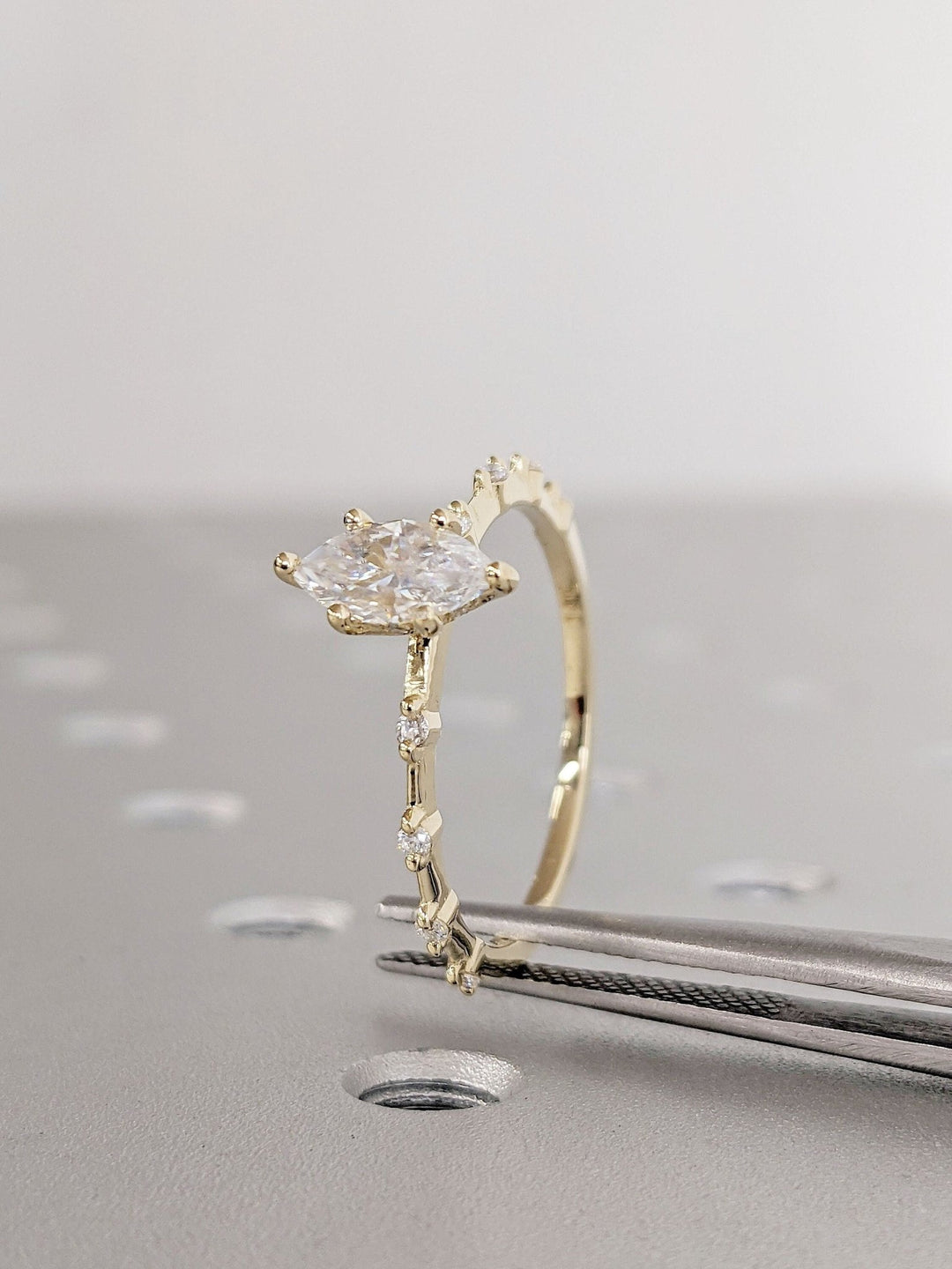 Marquise pave engagement ring offered in gold and platinum