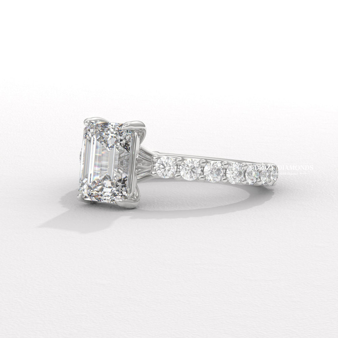 Emerald cut diamond ring worn on hand