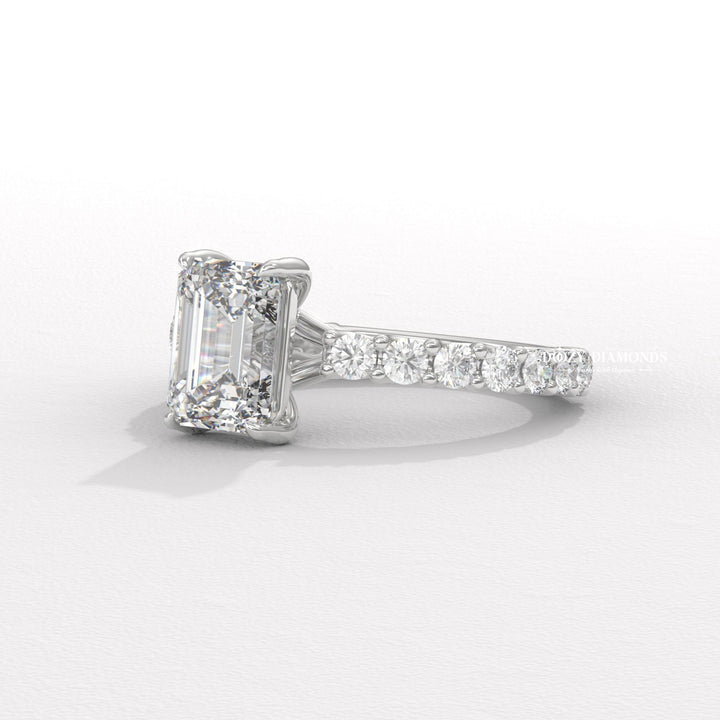 Emerald cut diamond ring worn on hand