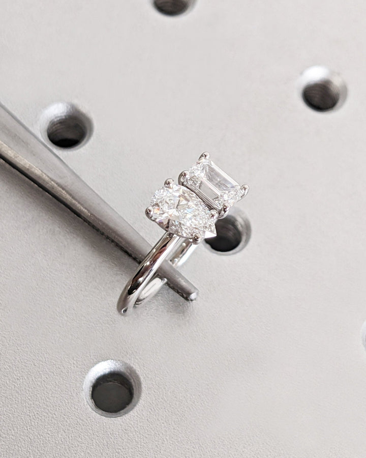 Macro shot of pear cut diamond facets in solitaire ring setting