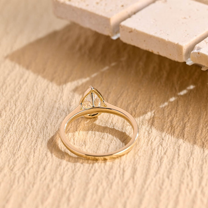 Classic pear halo engagement ring crafted for everyday wear