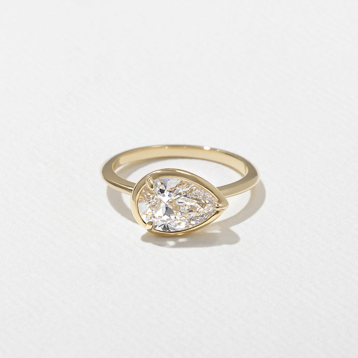 1.0CT Bezel Set Pear E - VS Lab Grown Diamond Ring With Unique Curved Band - Doozy Diamonds
