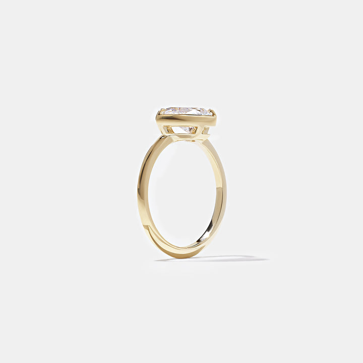 1.0CT Bezel Set Pear E - VS Lab Grown Diamond Ring With Unique Curved Band - Doozy Diamonds