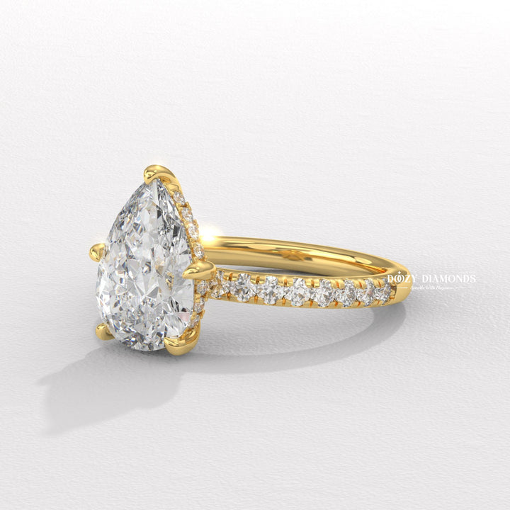 Angled view of pear cut diamond in solitaire setting