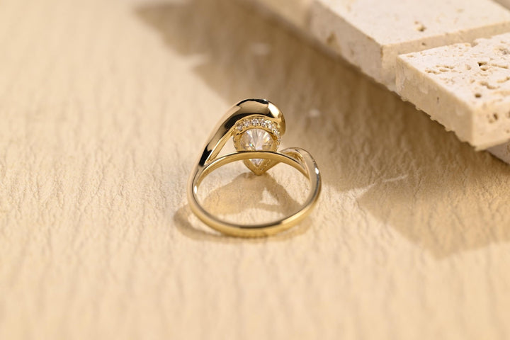 Side angle of pear solitaire diamond engagement ring
