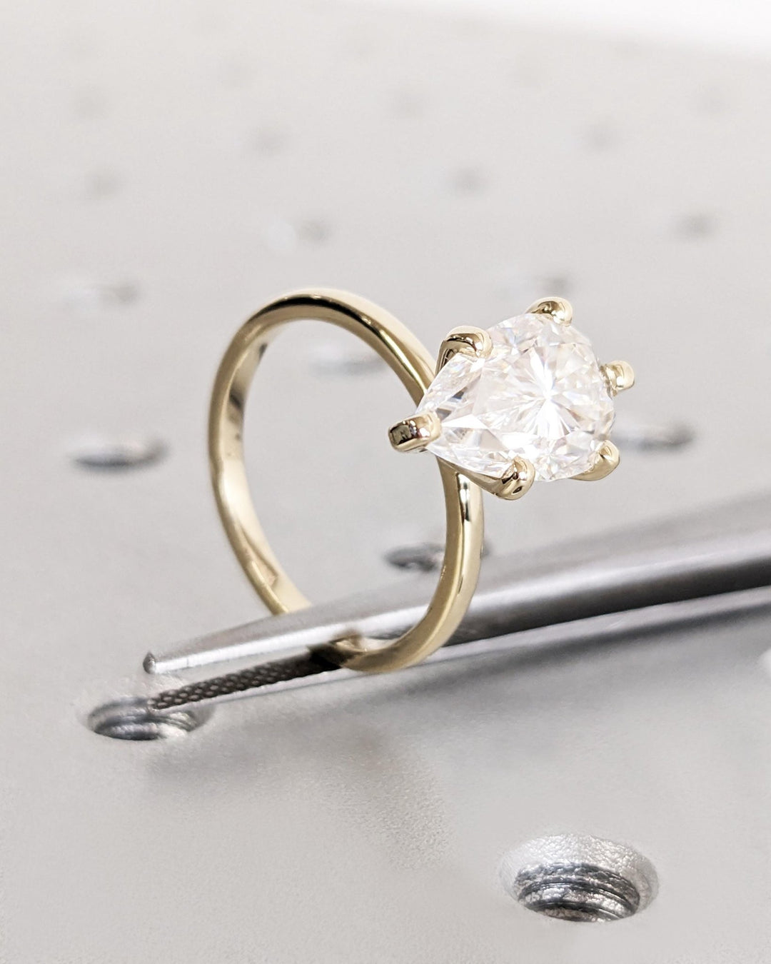 Shop the pear cut solitaire engagement ring collection online