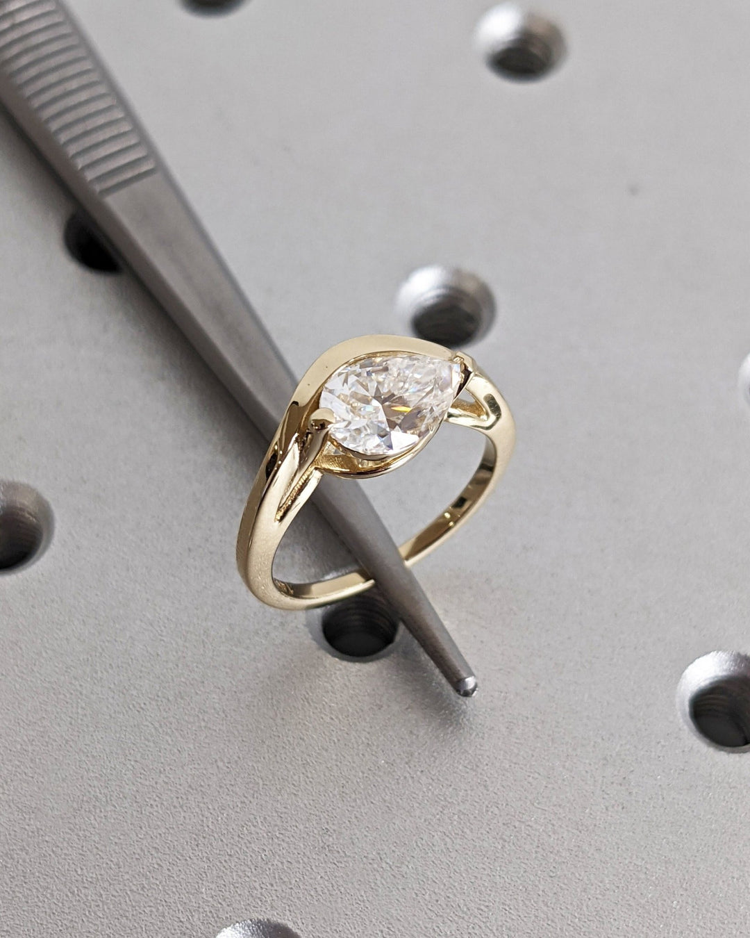 Shop the pear cut solitaire engagement ring collection online