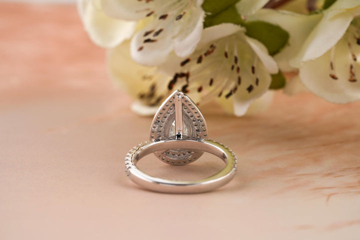 Pear halo lab grown diamond ring side profile in gold setting