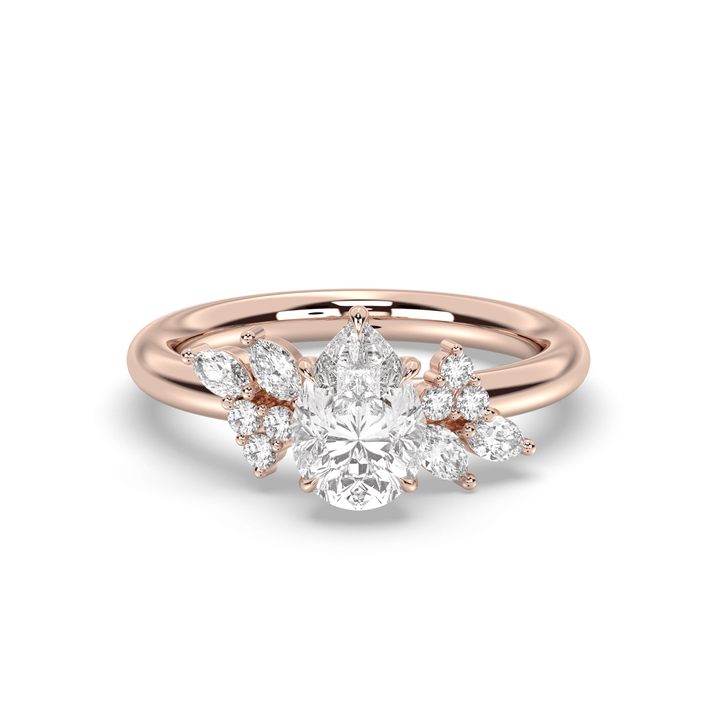 Top-down view of pear cut cluster engagement ring