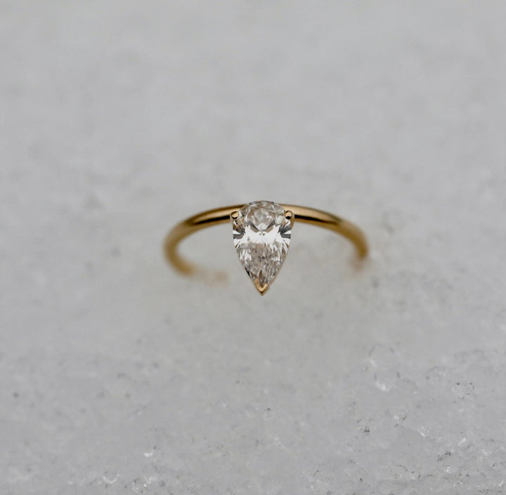 Handcrafted pear cut solitaire lab grown diamond engagement ring