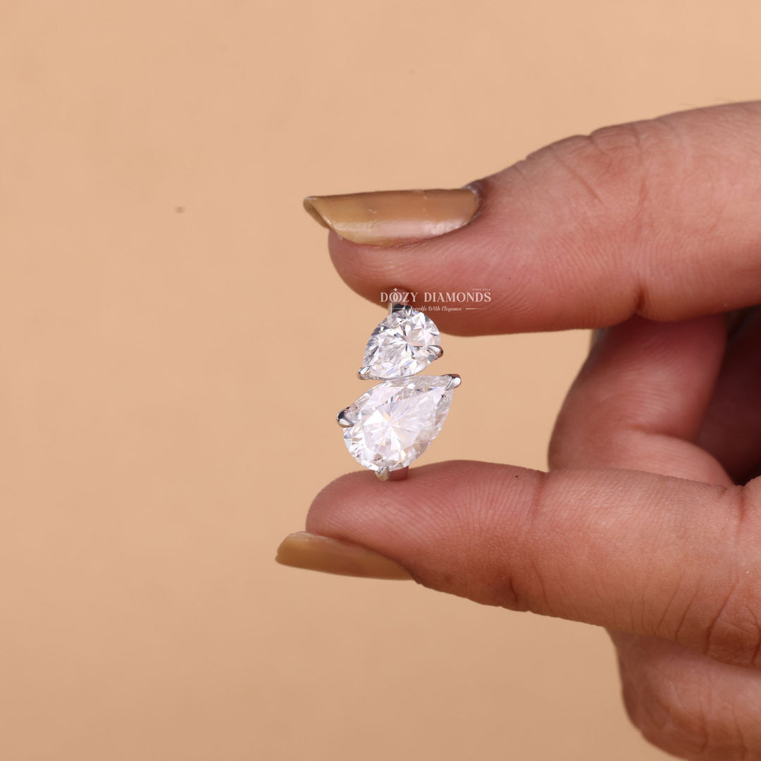 Pear cut solitaire engagement ring available to buy now