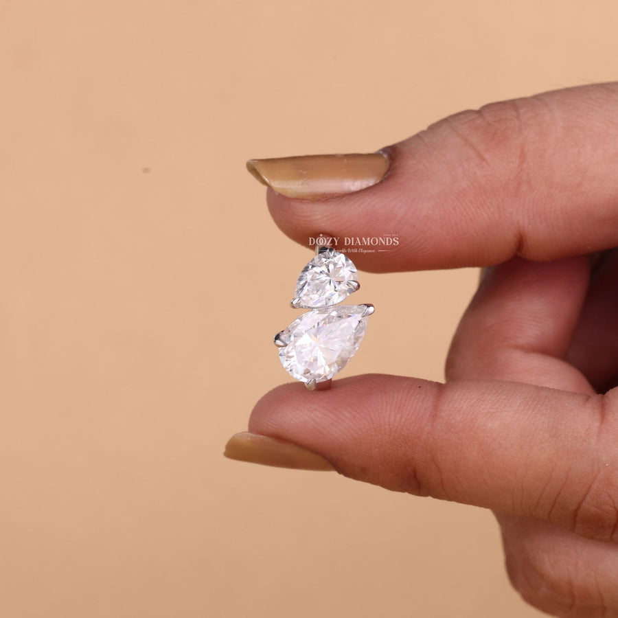 Pear cut solitaire engagement ring available to buy now