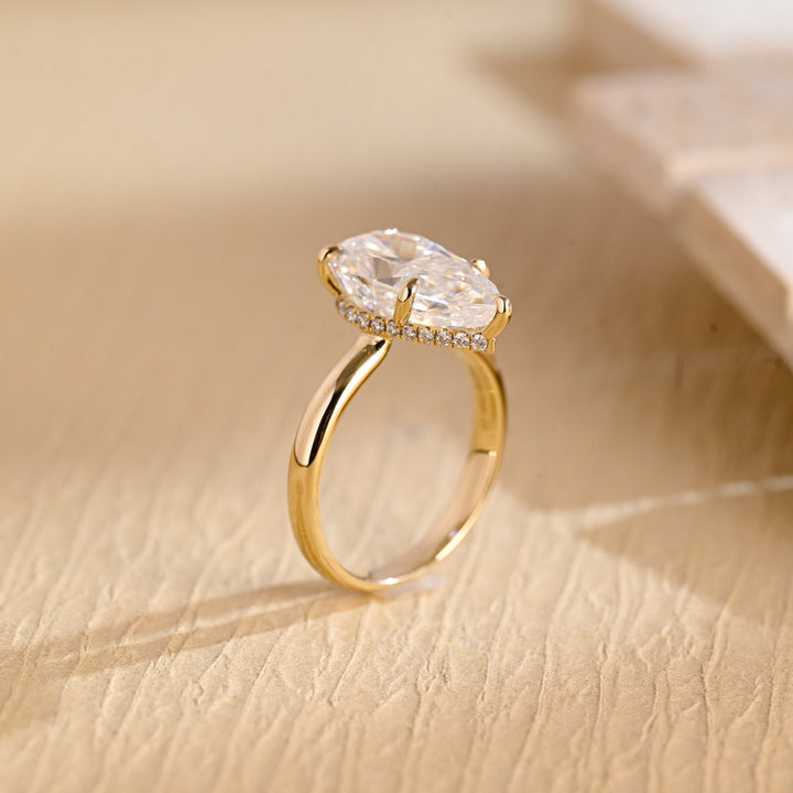 Pear hidden halo lab grown diamond ring side profile in gold setting
