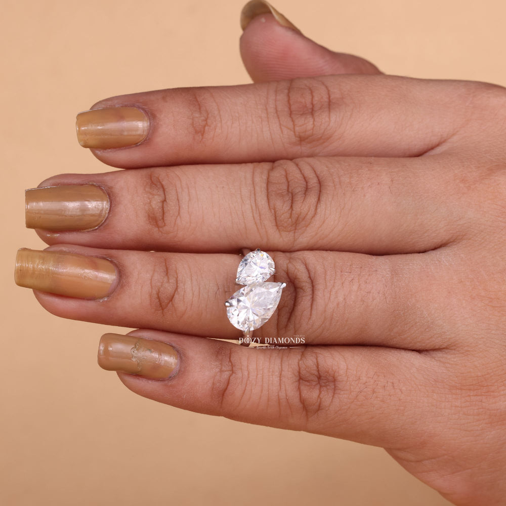 Detailed close-up of pear solitaire diamond engagement ring