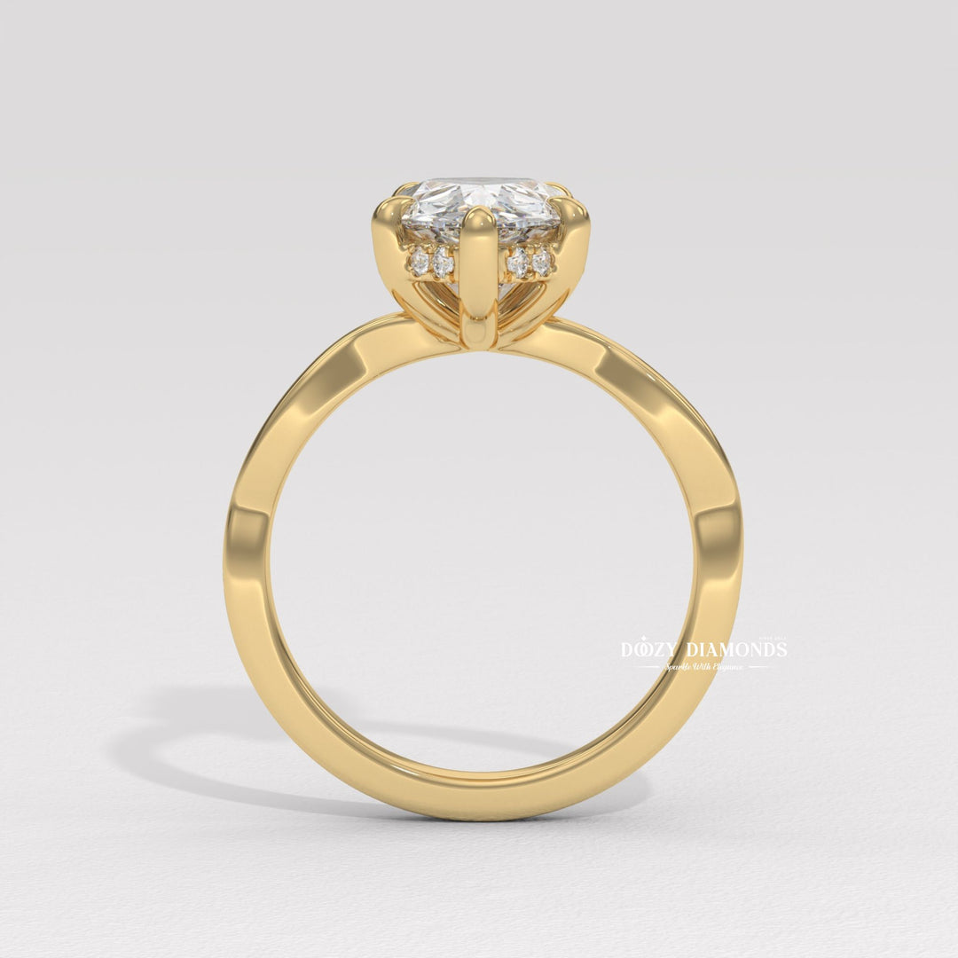 Pear solitaire lab grown diamond ring side profile in gold setting
