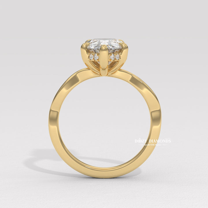 Pear solitaire lab grown diamond ring side profile in gold setting