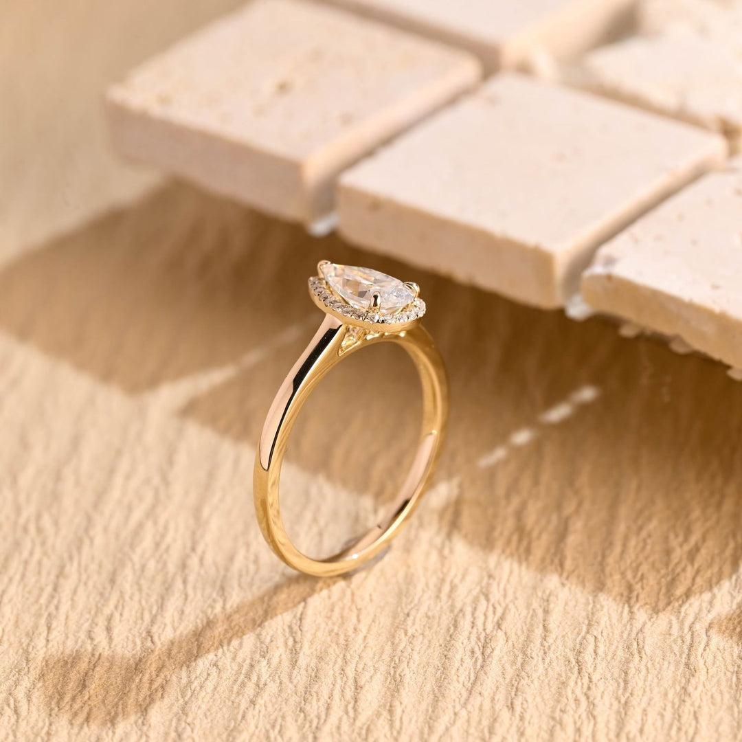 Fine craftsmanship detail on pear halo engagement ring