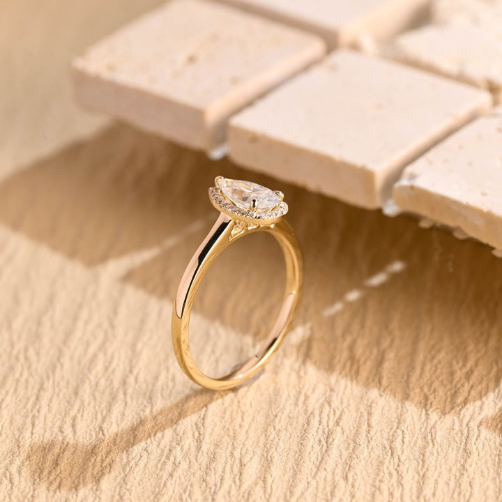 Fine craftsmanship detail on pear halo engagement ring