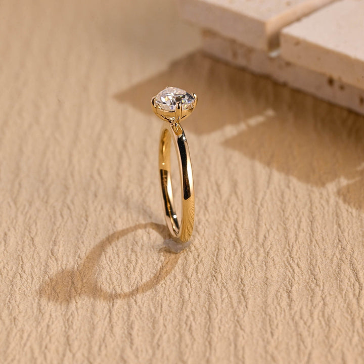 Fine craftsmanship detail on pear east west engagement ring