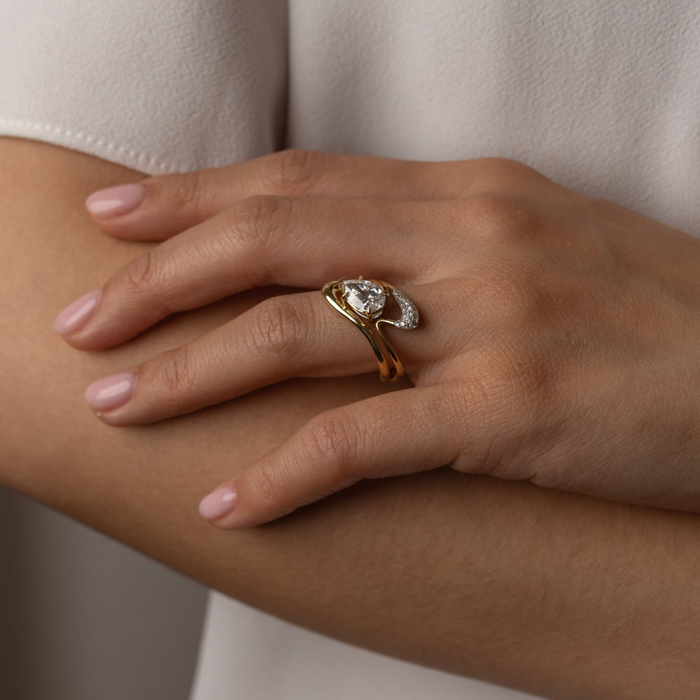 Angled view of pear cut diamond in solitaire setting