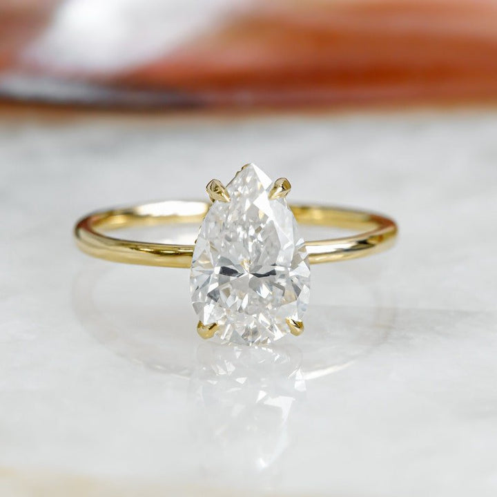 Discover pear hidden halo lab grown diamond engagement ring online