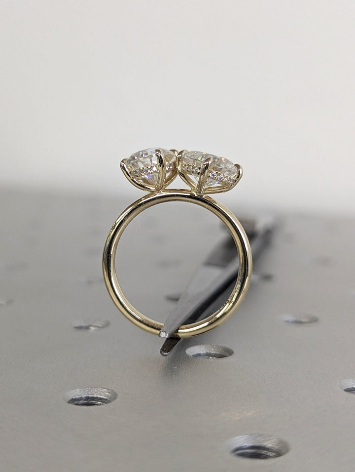 Pear hidden halo lab grown diamond ring side profile in gold setting