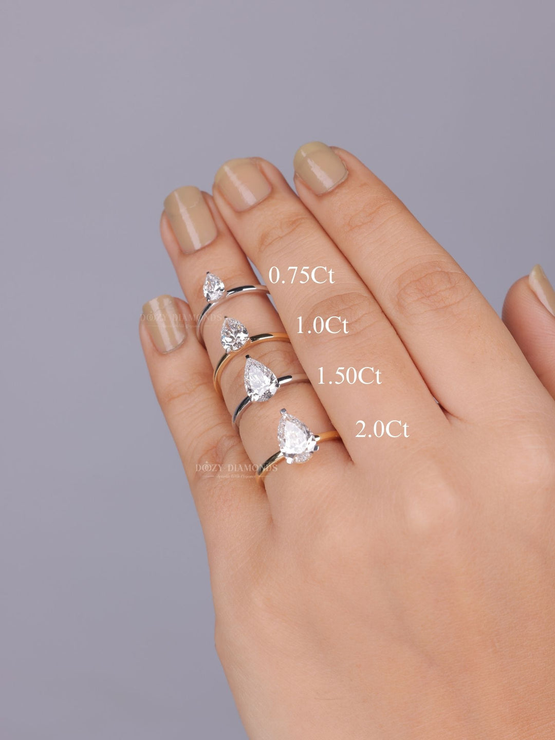 Profile view of pear cut solitaire engagement ring band