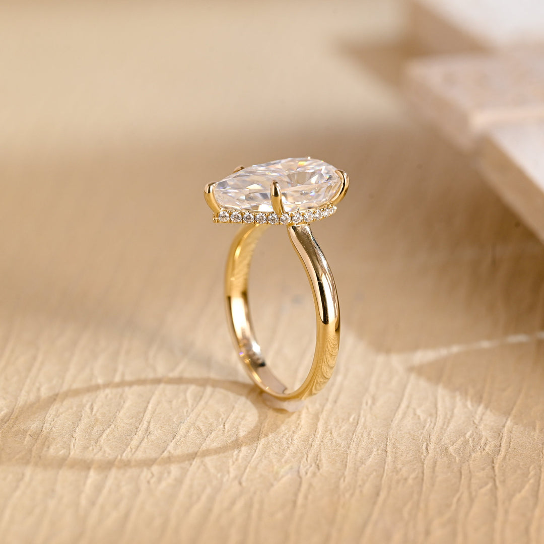 Pear cut engagement ring side view showing band detail