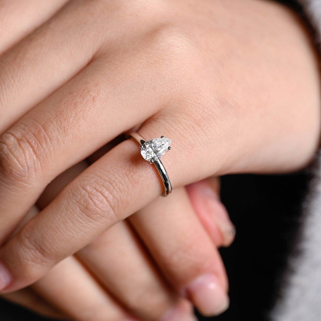 Top-down view of pear cut solitaire engagement ring
