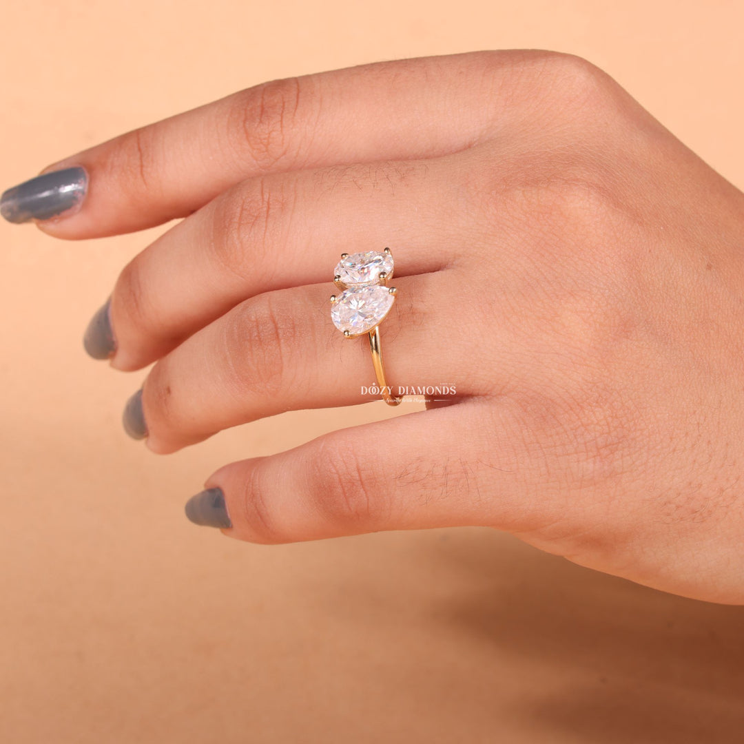 Oval solitaire engagement ring close-up showing E/VS2 diamond clarity
