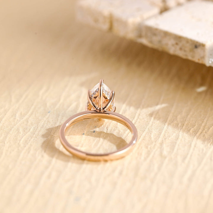 Pear hidden halo engagement ring with IGI certificate and packaging