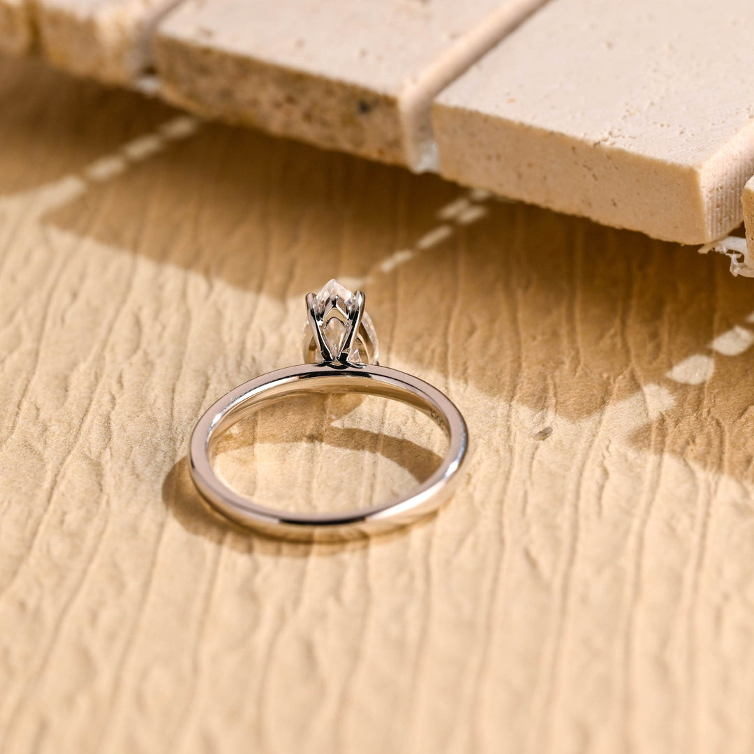 Handcrafted pear cut solitaire lab grown diamond engagement ring
