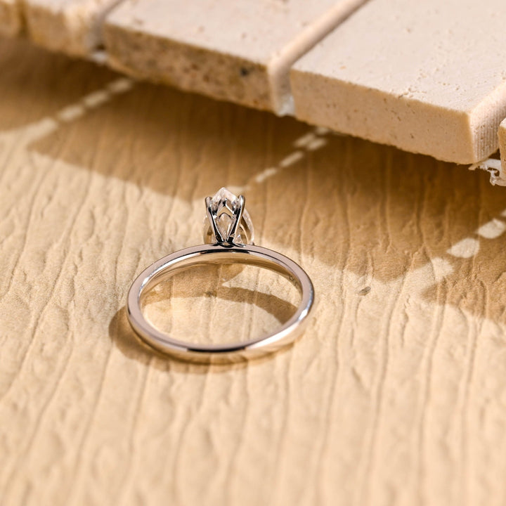 Handcrafted pear cut solitaire lab grown diamond engagement ring