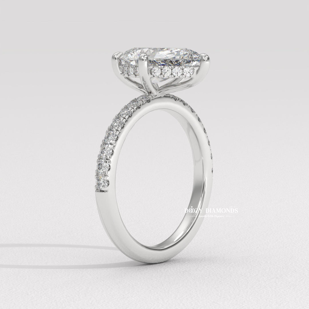 Detailed close-up of pear solitaire diamond engagement ring
