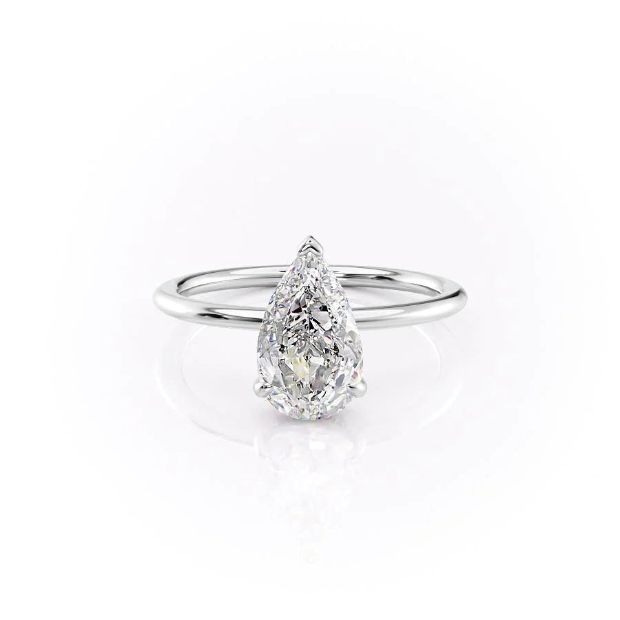 Pear hidden halo diamond engagement ring available in multiple metals