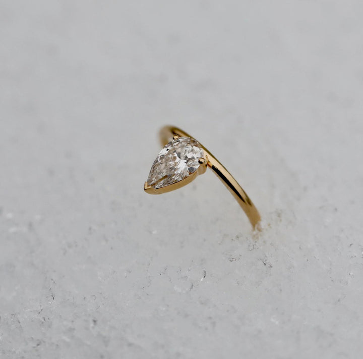 Classic pear solitaire engagement ring crafted for everyday wear