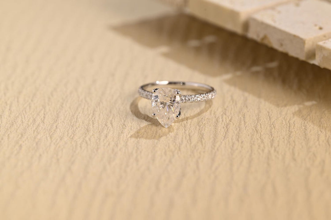 1.0CT pear cut hidden halo engagement ring available to buy now