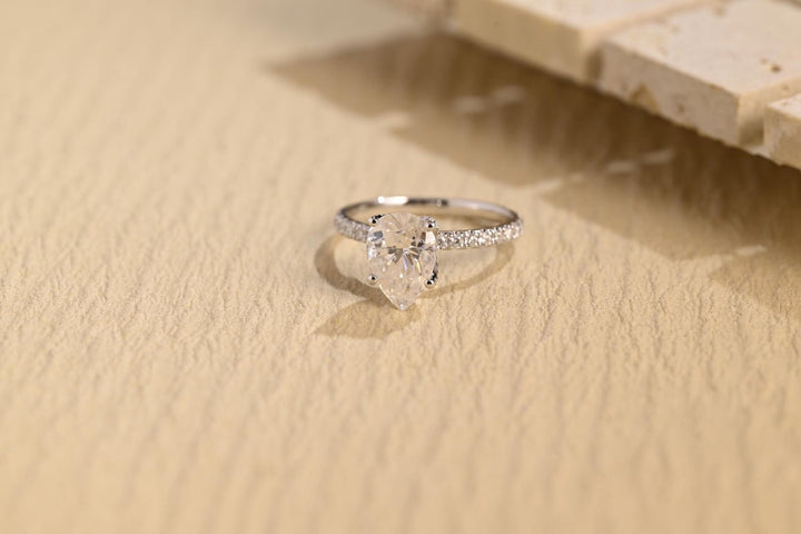 1.0CT pear cut hidden halo engagement ring available to buy now