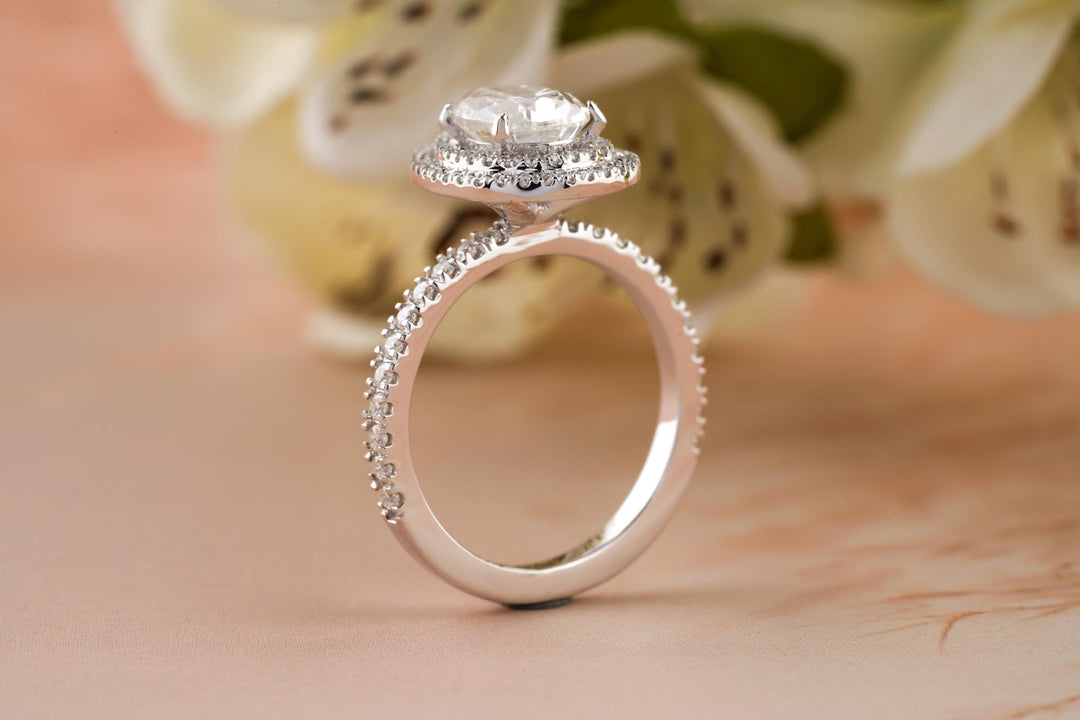 Pear cut engagement ring side view showing band detail
