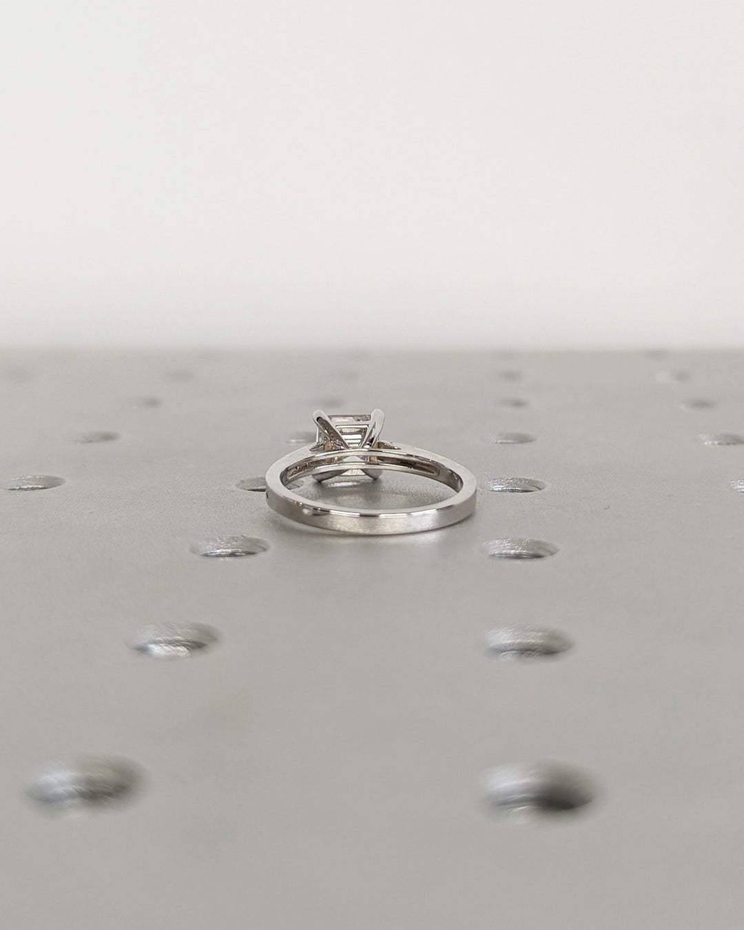 Asscher cut diamond ring worn on hand