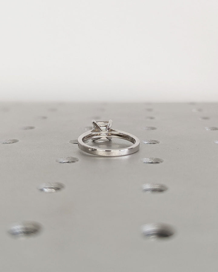 Asscher cut diamond ring worn on hand