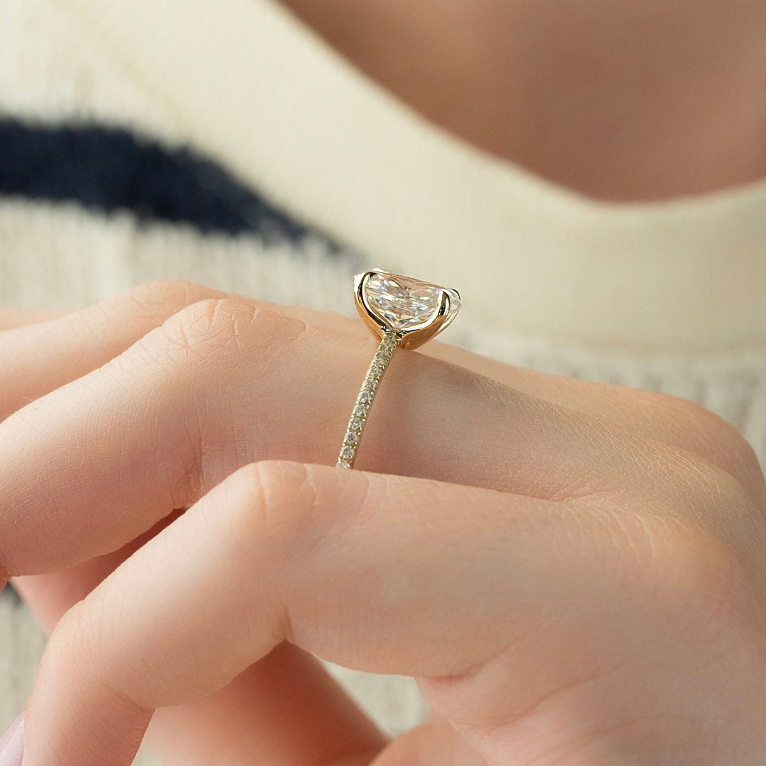 Oval pave engagement ring offered in gold and platinum