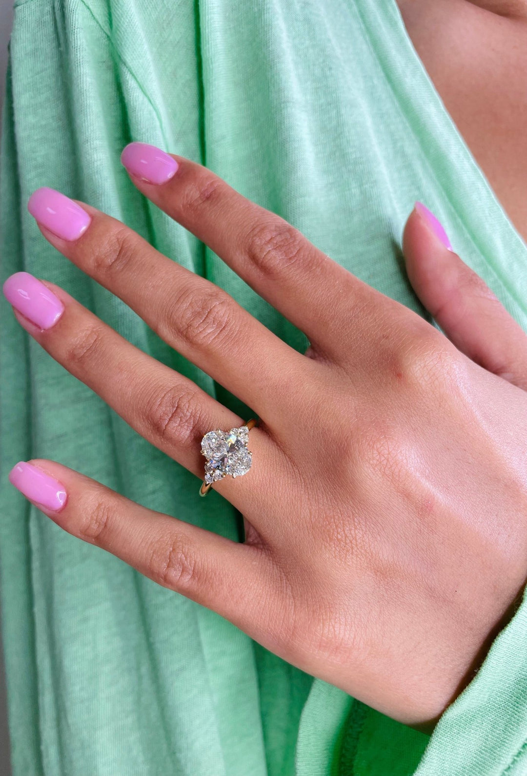 Oval cut engagement ring side view showing band detail