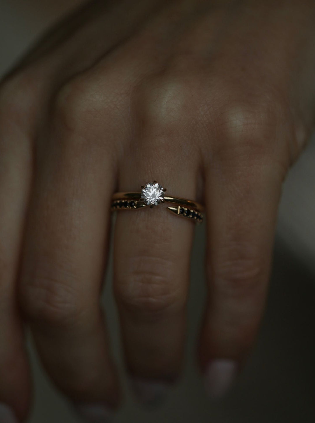 Round solitaire diamond engagement ring available in multiple metals