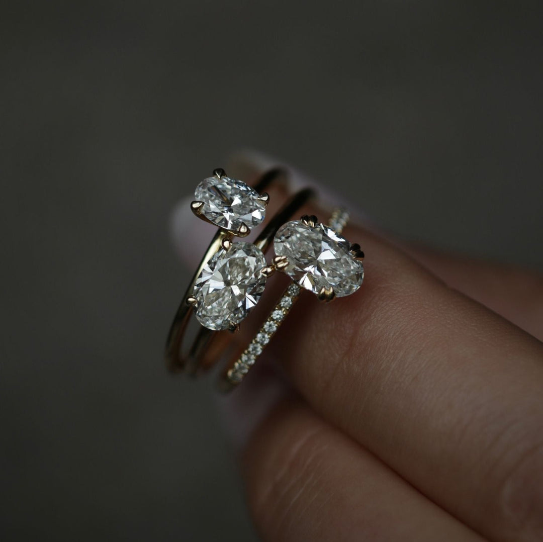 Profile view of oval cut solitaire engagement ring band