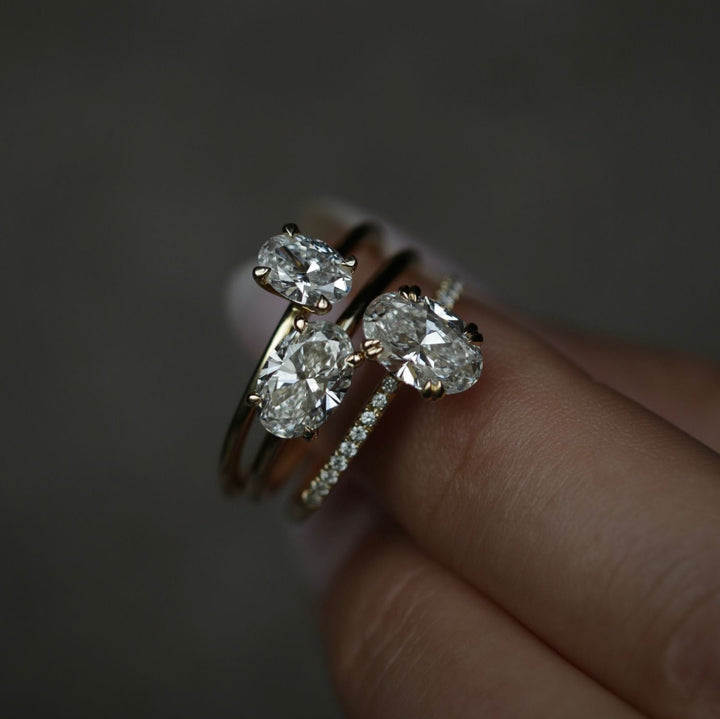 Profile view of oval cut solitaire engagement ring band