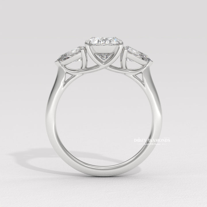 Side angle of oval three stone diamond engagement ring